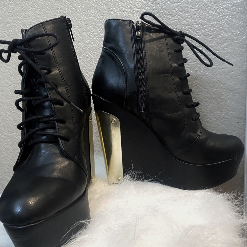 Call it spring Black and Gold High tops